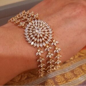 Rosegold metal with CZ stones festive ornate partywear chain bracelete